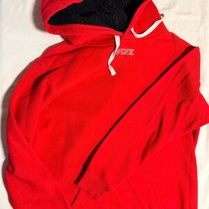 PINK BLING Red hoodie with fleece lined hood. Bling PINK sequin logo on back